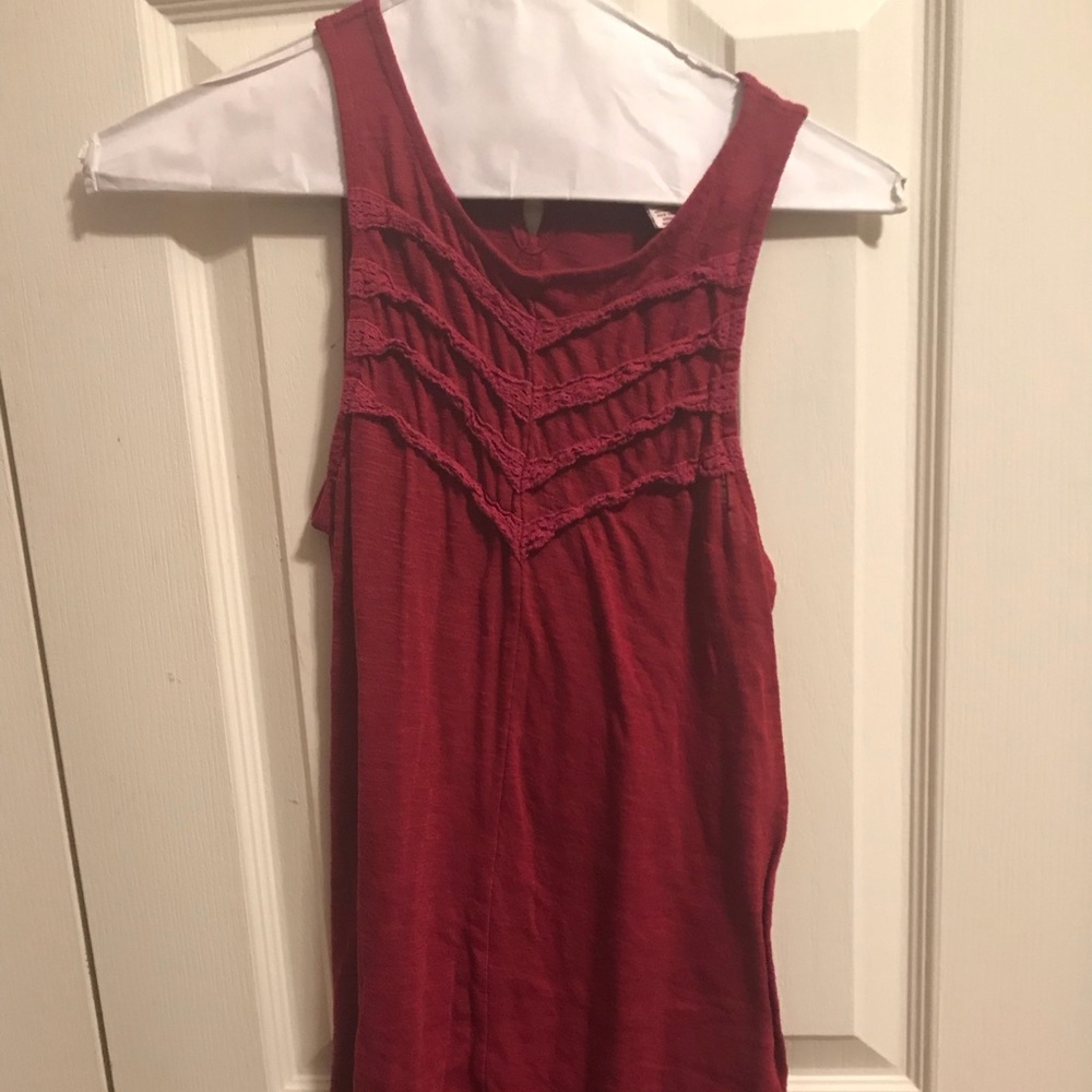 Maroon Tank with ruffles.